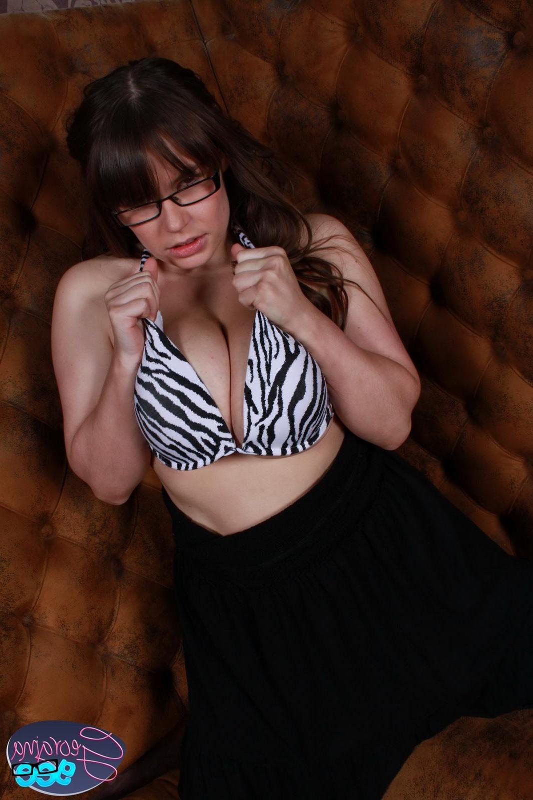 16P Big boobed babe squeezes her huge boobs into a tiny zebra print bikini