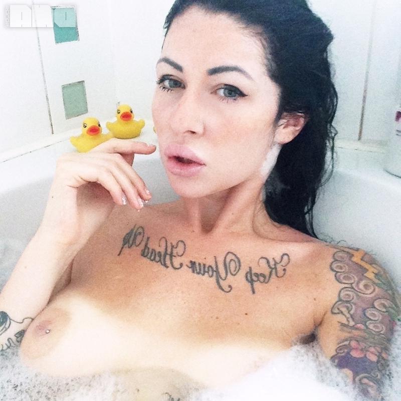 10P Brunette babe Harri Kate gets all wet in the bath