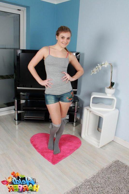 16P Pictures of teen chick Heidi Harper teasing in the living room