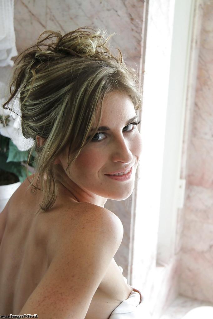 16P Svelte babe with long legs and tiny tits posing topless in the bath
