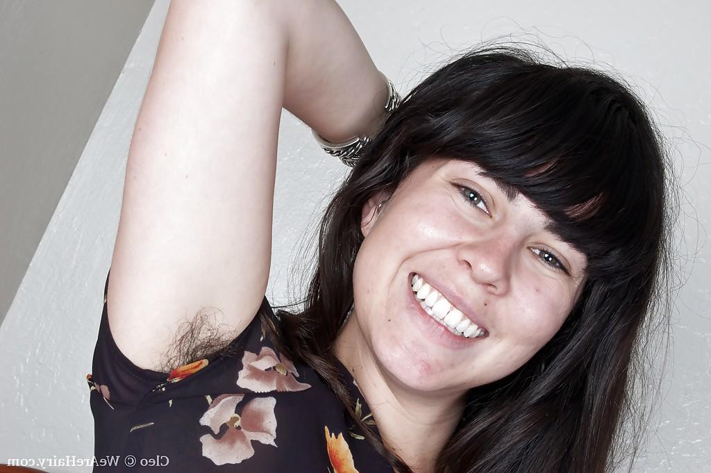 16P Brunette babe with hairy armpits and bushy cunt taking off her clothes