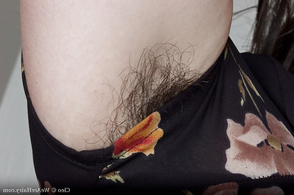 16P Brunette babe with hairy armpits and bushy cunt taking off her clothes