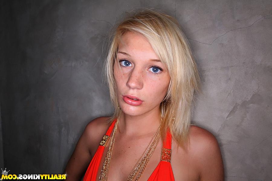 14P Cute blond girl Sammie Rhodes poses in bikini keeping straight face