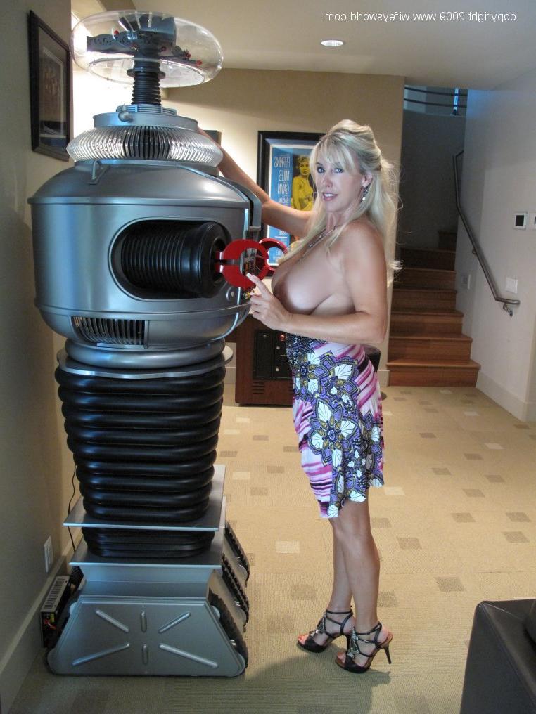 16P Mature wife with big tits poses on high heels and fondles her melons