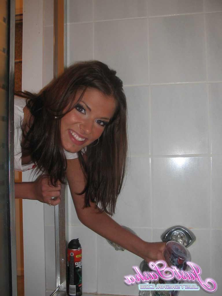 20P Pictures of teen model Just Sasha taking a hot bath