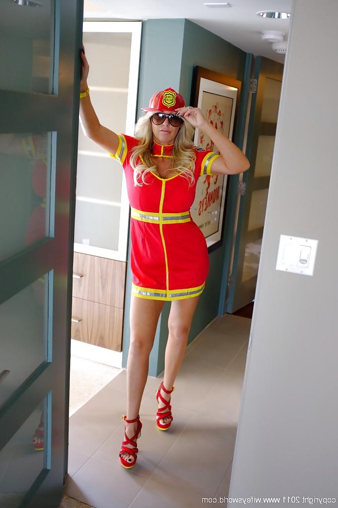 16P Blonde MILF in firefighter uniform uncovering her big round bosoms