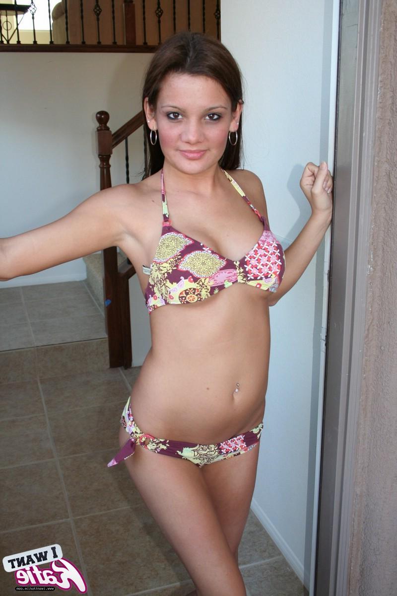 12P Teenage slut Katie welcomes you to her home by stripping out of her bikini at the front door