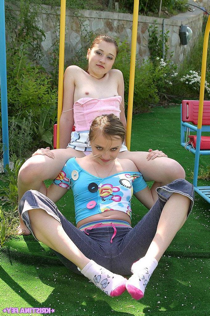 15P Pictures of two teen girls making out in a park