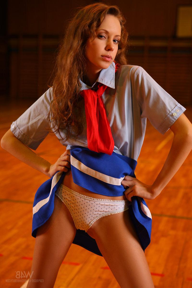 16P Sexy brunette teen Natasha dresses up like a Japanese schoolgirl in "Pioneer"