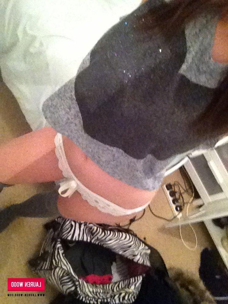 12P Lauren strips her top and frilly white bra to show you her boobs