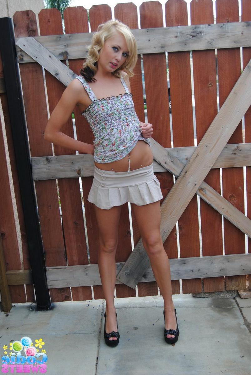 12P Cute tease Codie Sweets proves that she has no panties on under her skirt