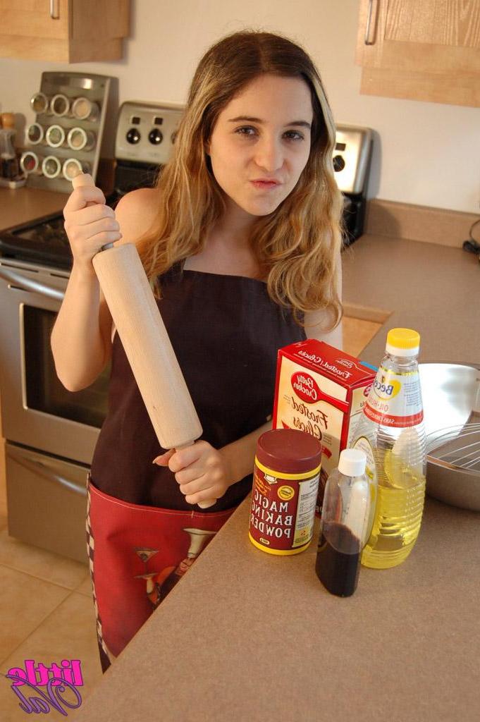 15P Pictures of teen girl Little Val getting kinky in the kitchen