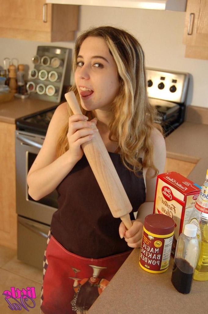 15P Pictures of teen girl Little Val getting kinky in the kitchen