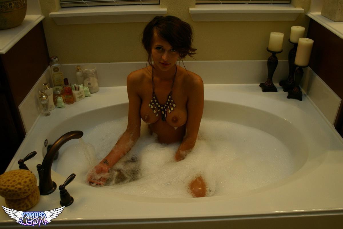 20P Busty brunette girl London Hart invites you to take a steamy bubble bath with her
