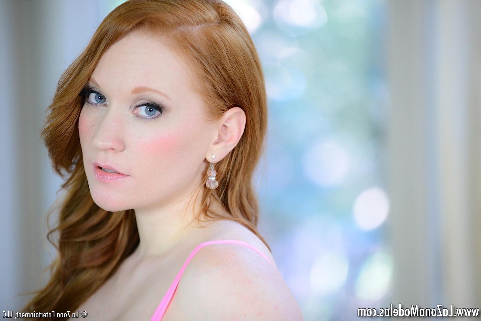 15P Lucy Ohara has on matching pink bra and panties as she slips them off in bed and masturbates