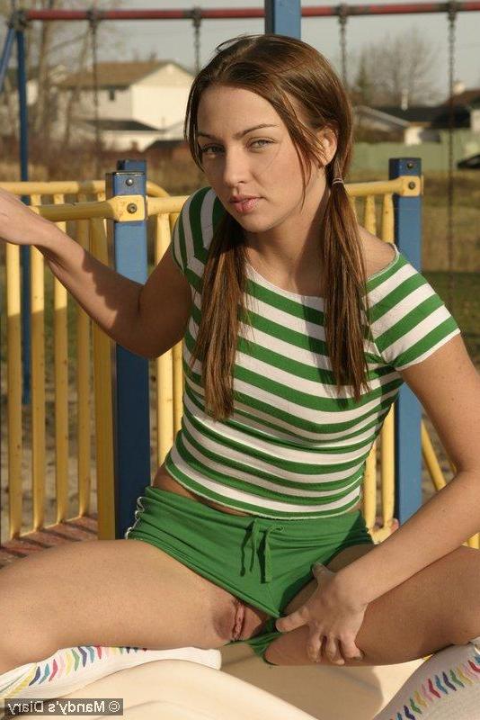 20P Pictures of teen girl Mandy's Diary teasing in a park
