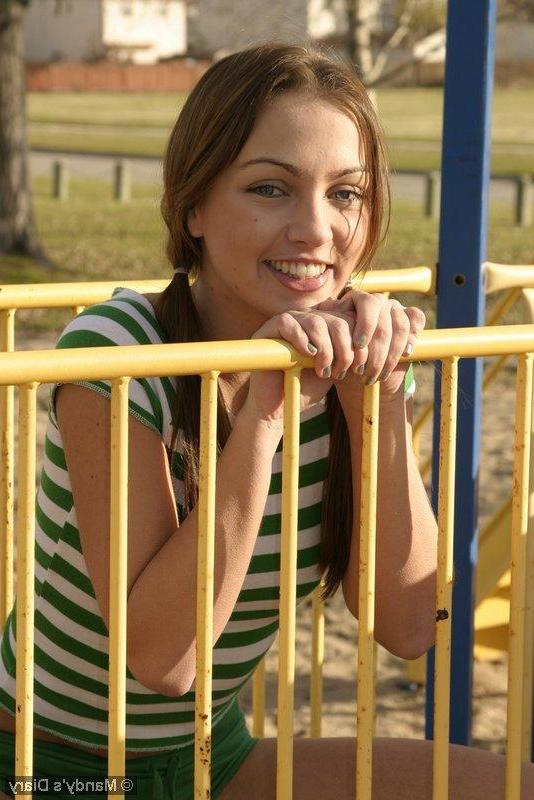 20P Pictures of teen girl Mandy's Diary teasing in a park