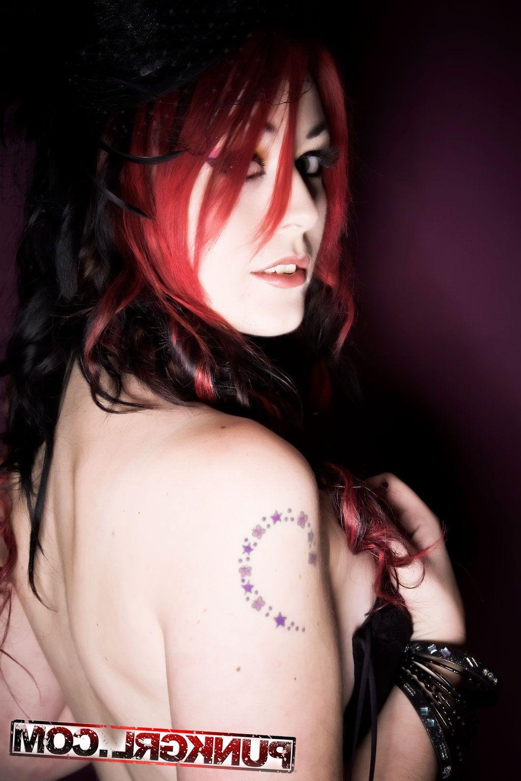 20P Pictures of punk girl Miss Kitty dressed as a sexy widow