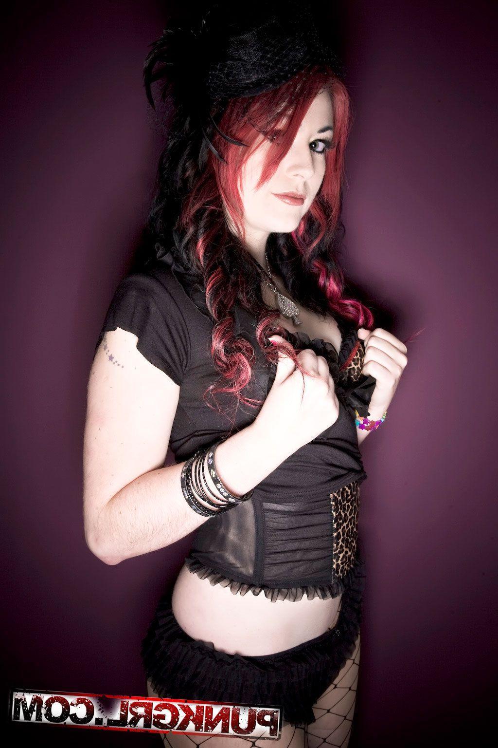 20P Pictures of punk girl Miss Kitty dressed as a sexy widow