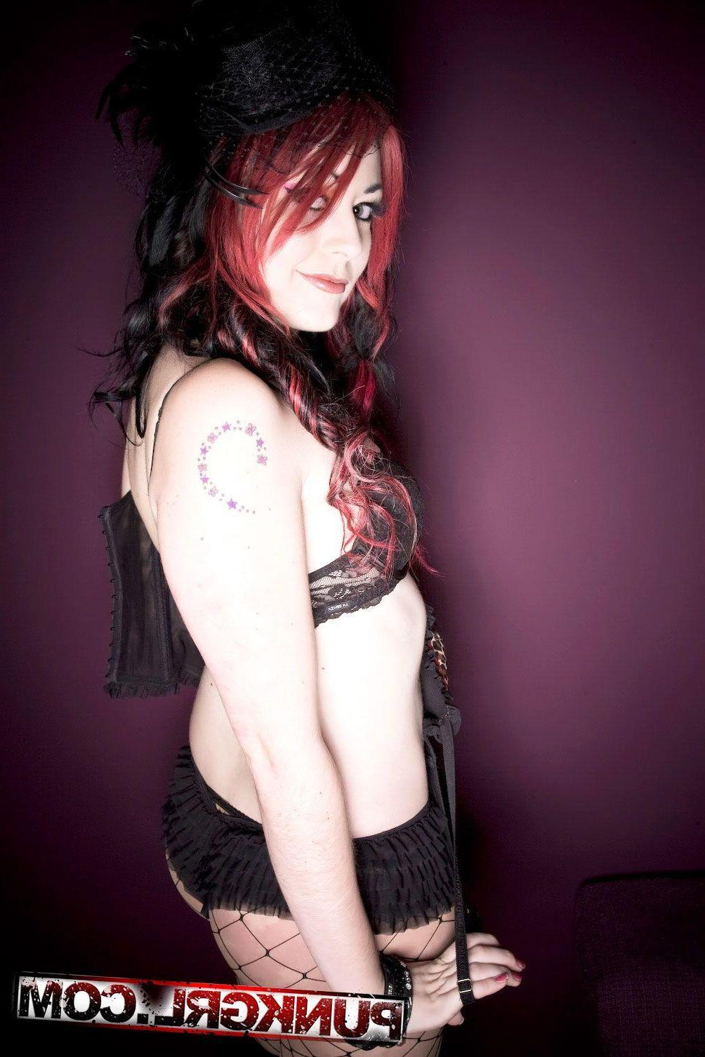20P Pictures of punk girl Miss Kitty dressed as a sexy widow