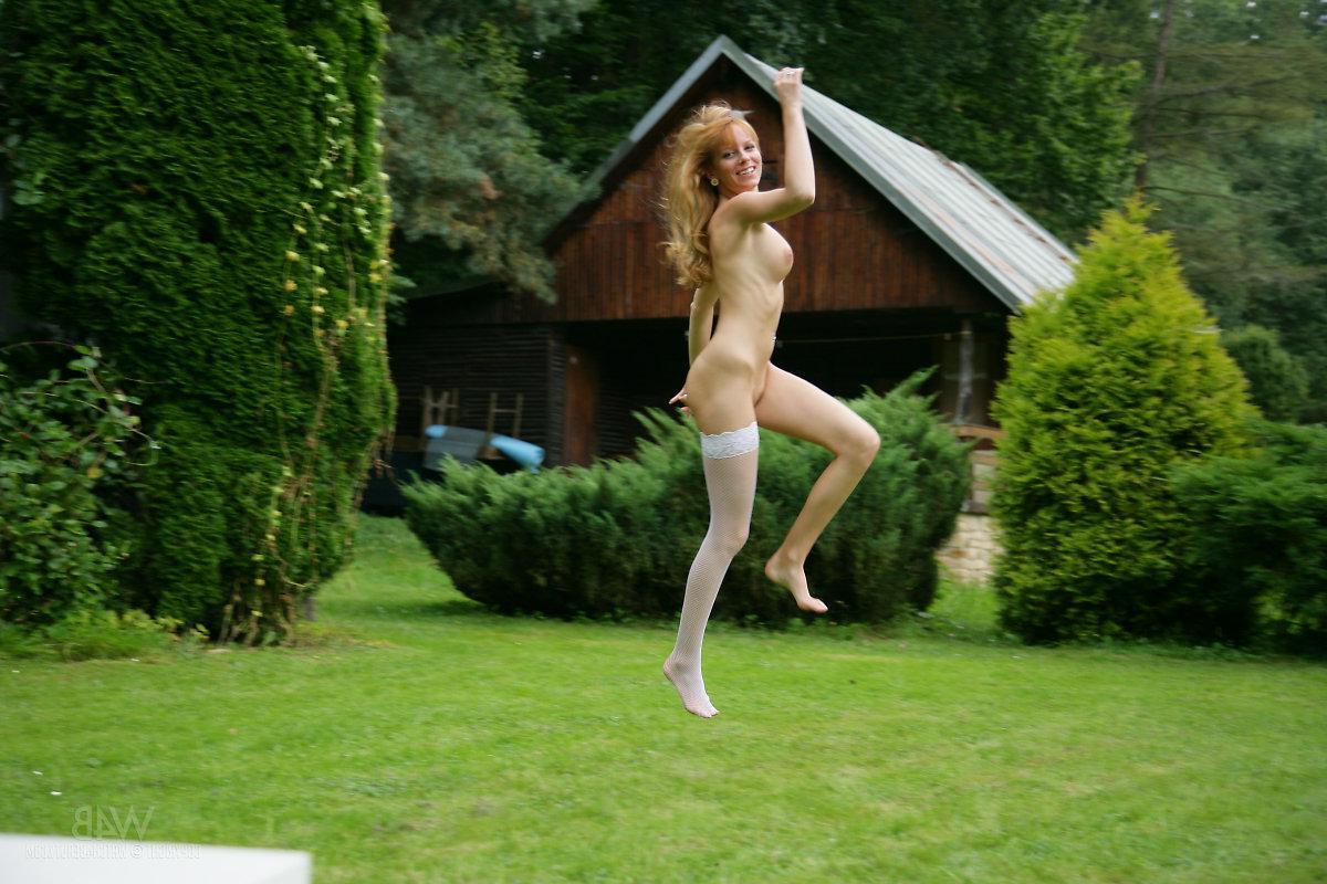 16P Busty hottie Monica Keyes displays her big tits and tight pussy in the garden