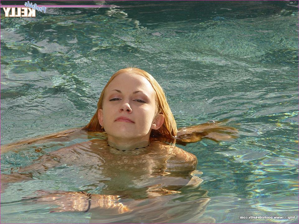 15P Pictures of teen girl Poolside Kelly completely nude by the pool