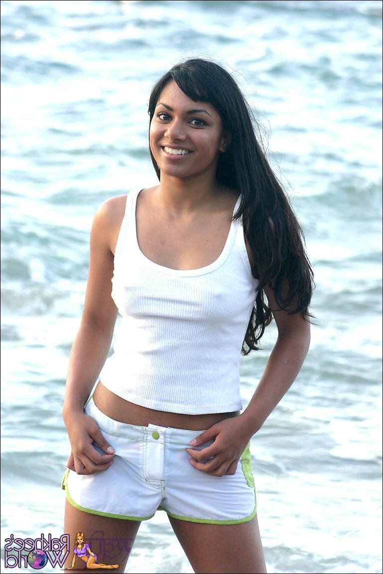 20P Pictures of teen girl Rakhee's World getting all wet for you