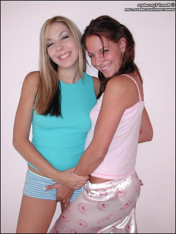 20P Pictures of two naked teen girls cuddling together