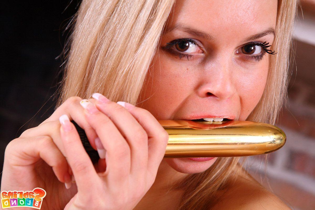 15P Pictures of teen model Sabrina Blond toying her tight asshole with a vibrator