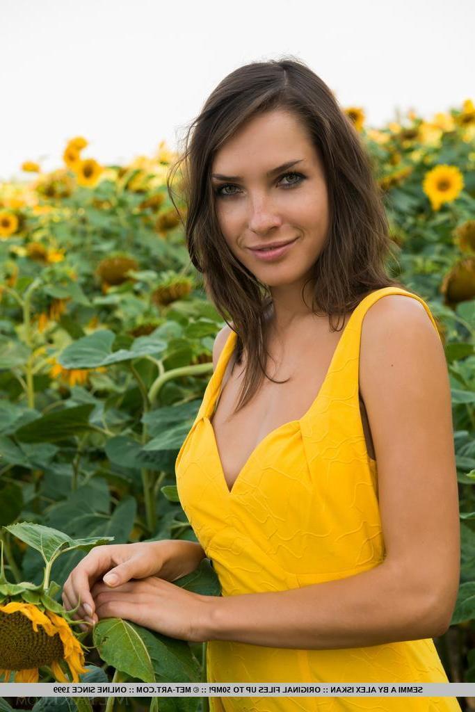 18P Brunette teen Semmi A gives you her pretty flower in the garden