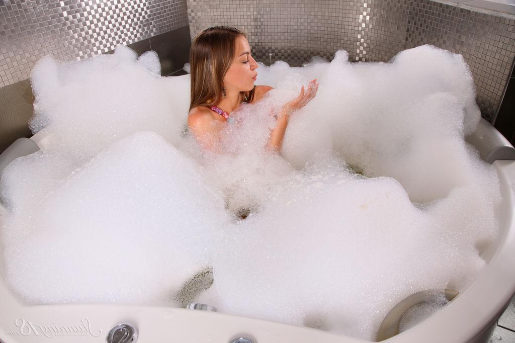 16P Brunette teen Sofy B gets all wet for you in a hot bath