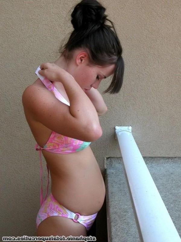 15P Stephanie hides her huge teen tits in a bikini