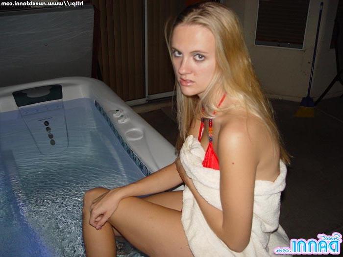 15P Pictures of Sweet Danni going for a dip in the hot tub
