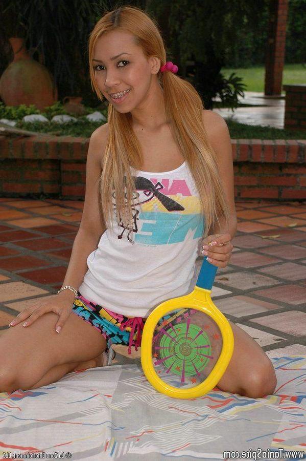 15P Pictures of Tania Spice toying her tight teen asshole outside