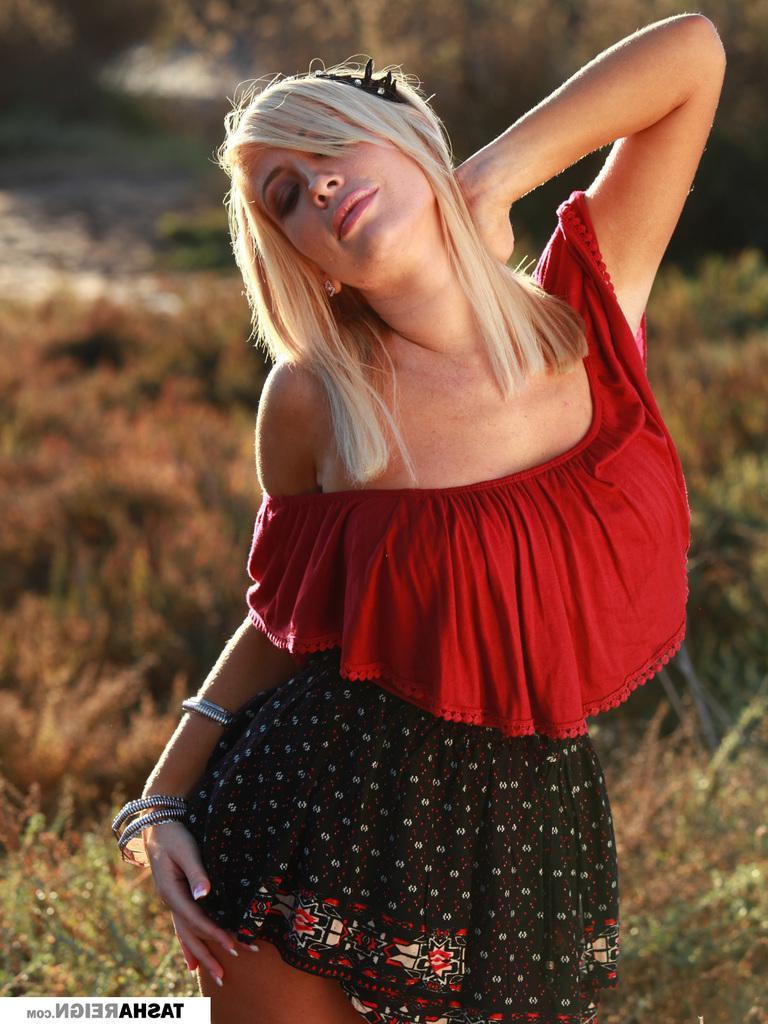 15P Blonde babe Tasha Reign teases with her panties outside
