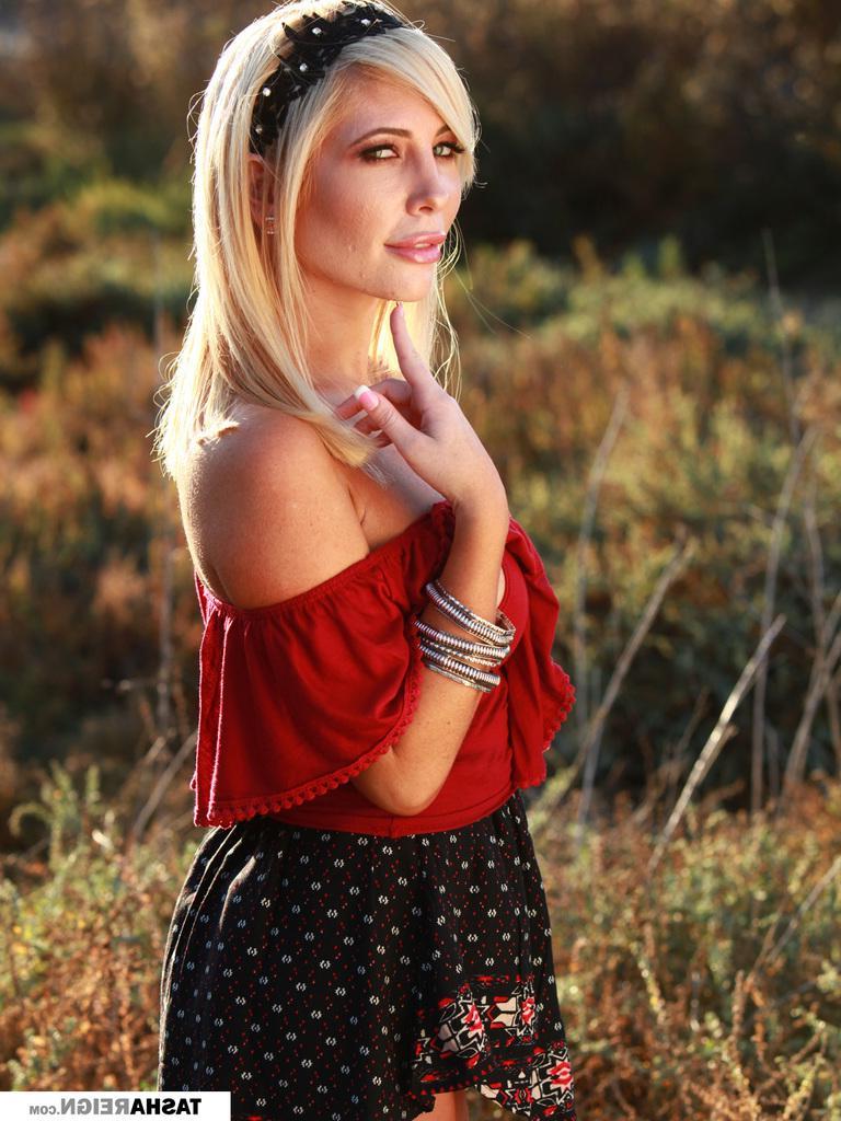 15P Blonde babe Tasha Reign teases with her panties outside