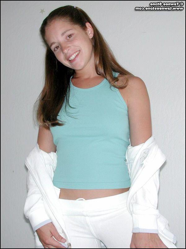 20P Pictures of Tawnee Stone slipping out of her clothes