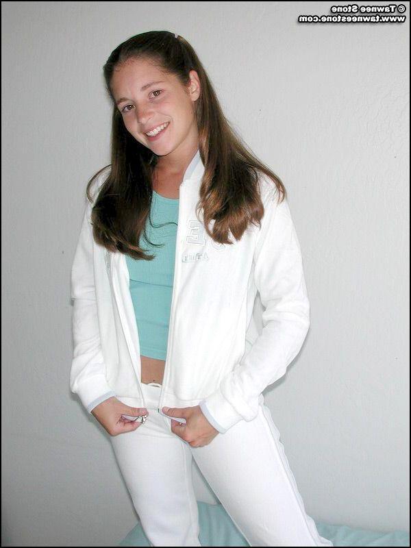 20P Pictures of Tawnee Stone slipping out of her clothes