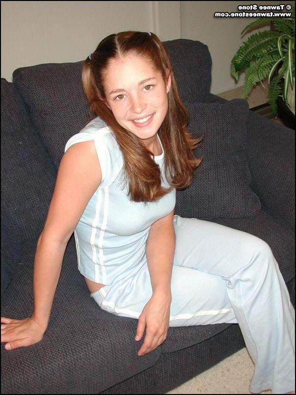 20P Pictures of teen babe Tawnee Stone showing you her boobs
