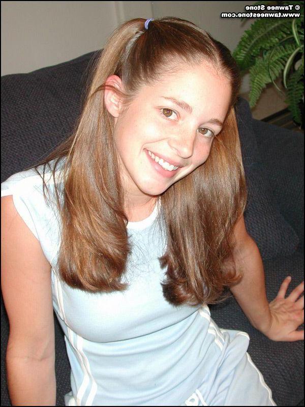 20P Pictures of teen babe Tawnee Stone showing you her boobs
