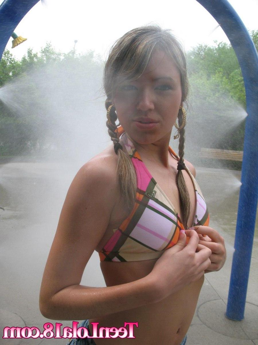 15P Pictures of Teen Lola 18 getting herself all wet