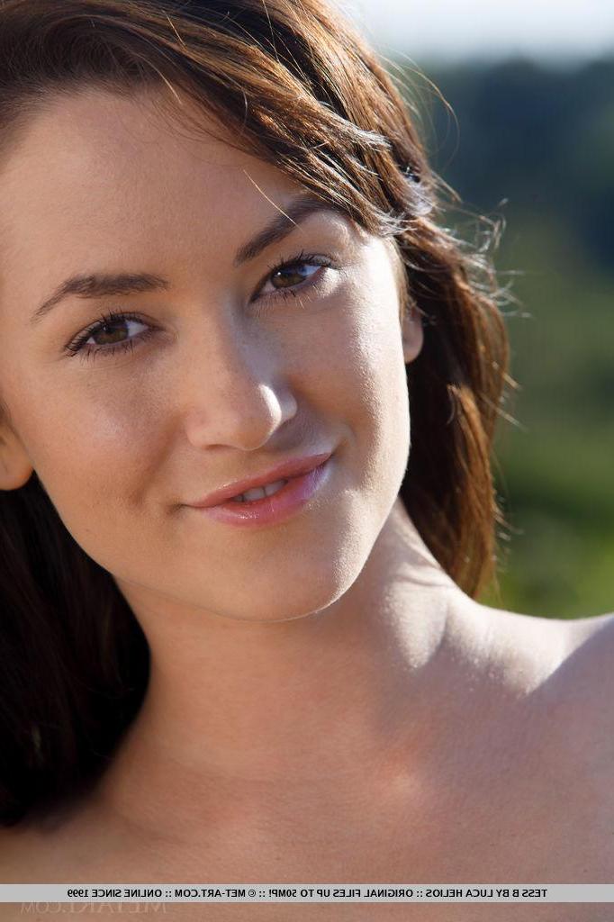 18P Brunette hottie Tess Lyndon strips out of her bikini outside
