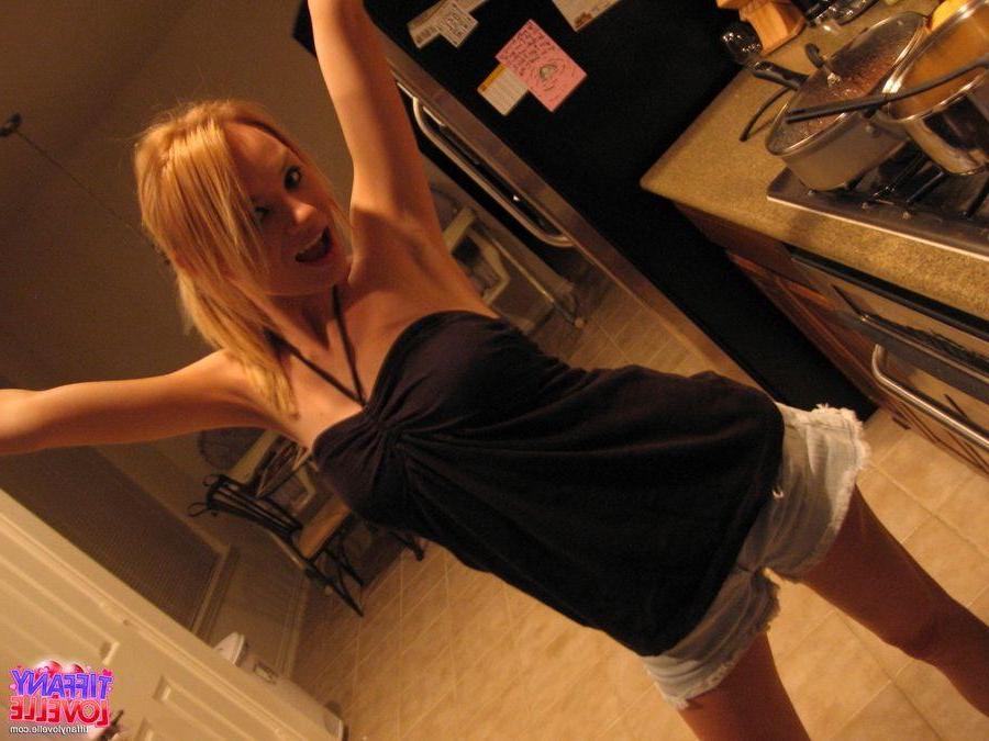 13P Pictures of teen girl Tiffany Lovelle being naughty in the kitchen