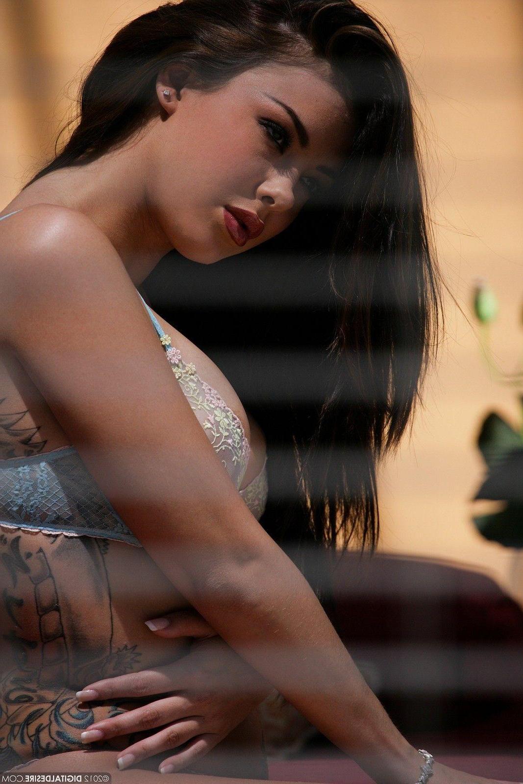 17P Pictures of a beautiful brunette model stripping