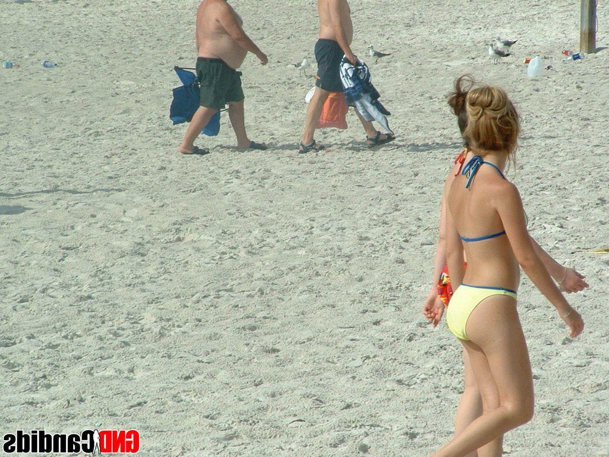 12P Pictures of bikini teens on a beach