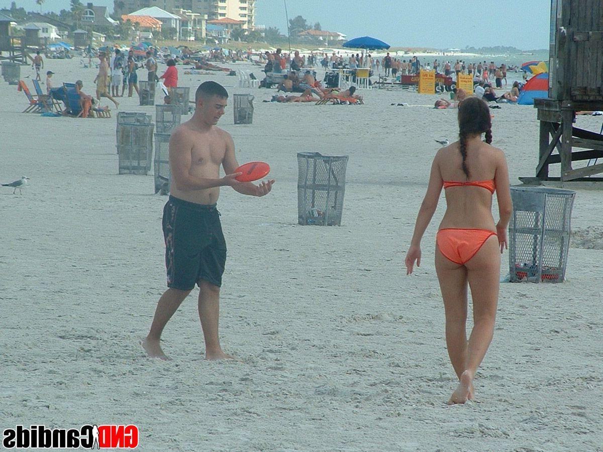 12P Pictures of bikini teens on a beach