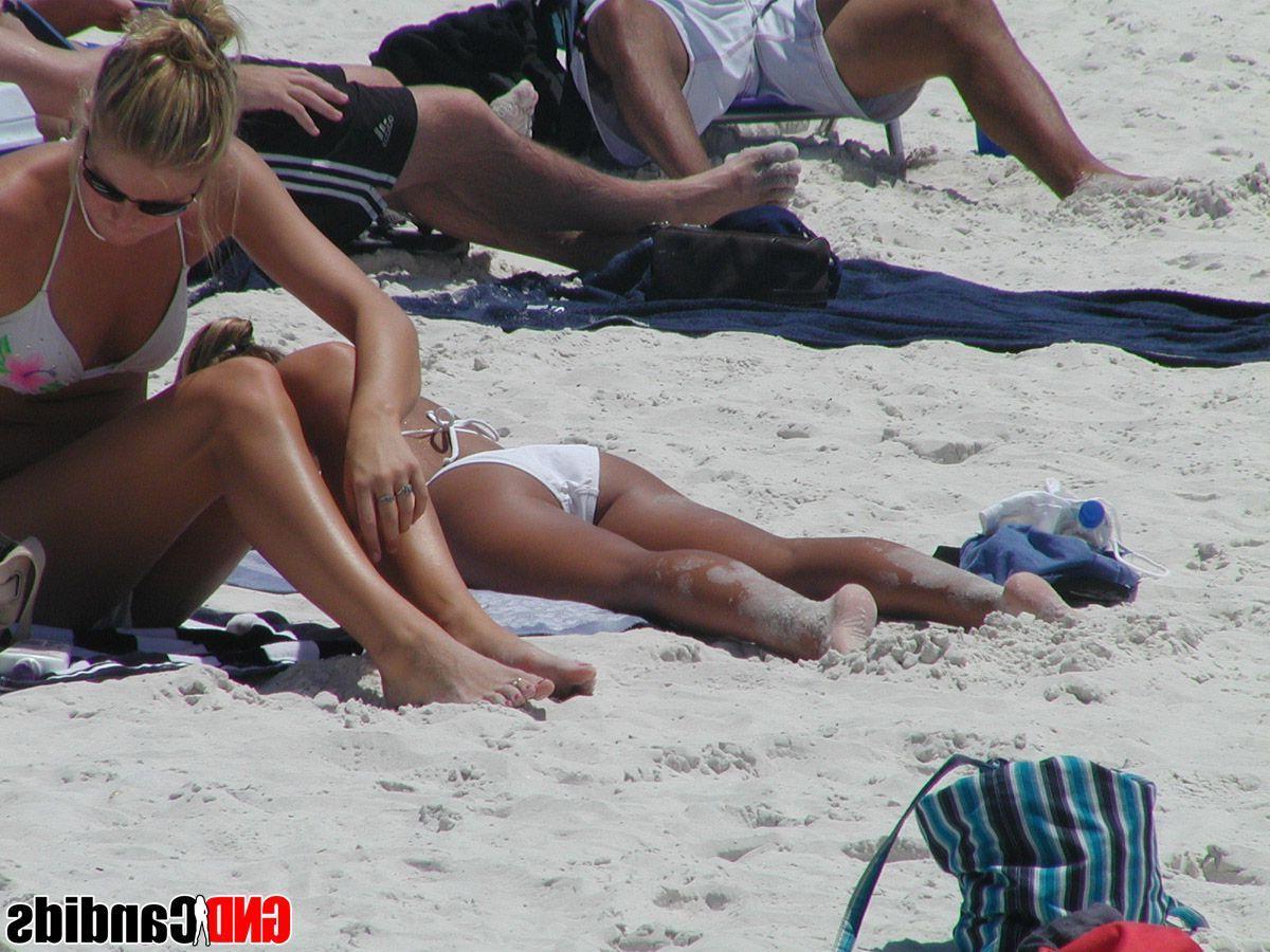 12P Pictures of hot and horny bikini girls on the beach