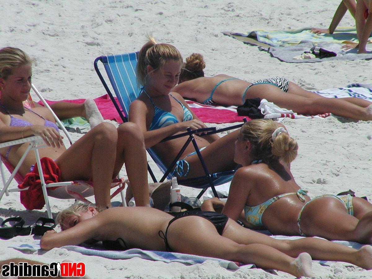 12P Pictures of hot and horny bikini girls on the beach