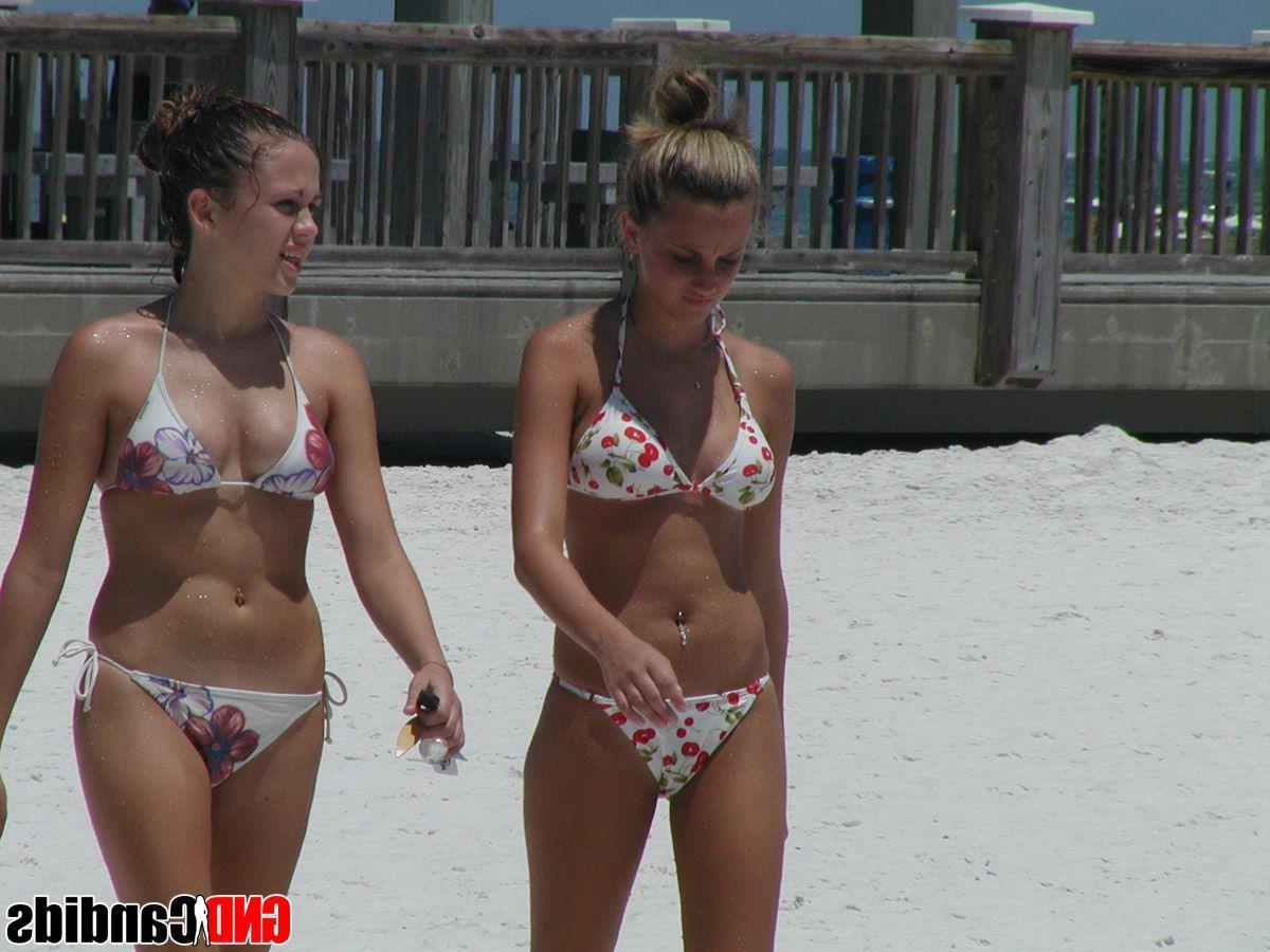 12P Pictures of hot and horny bikini girls on the beach