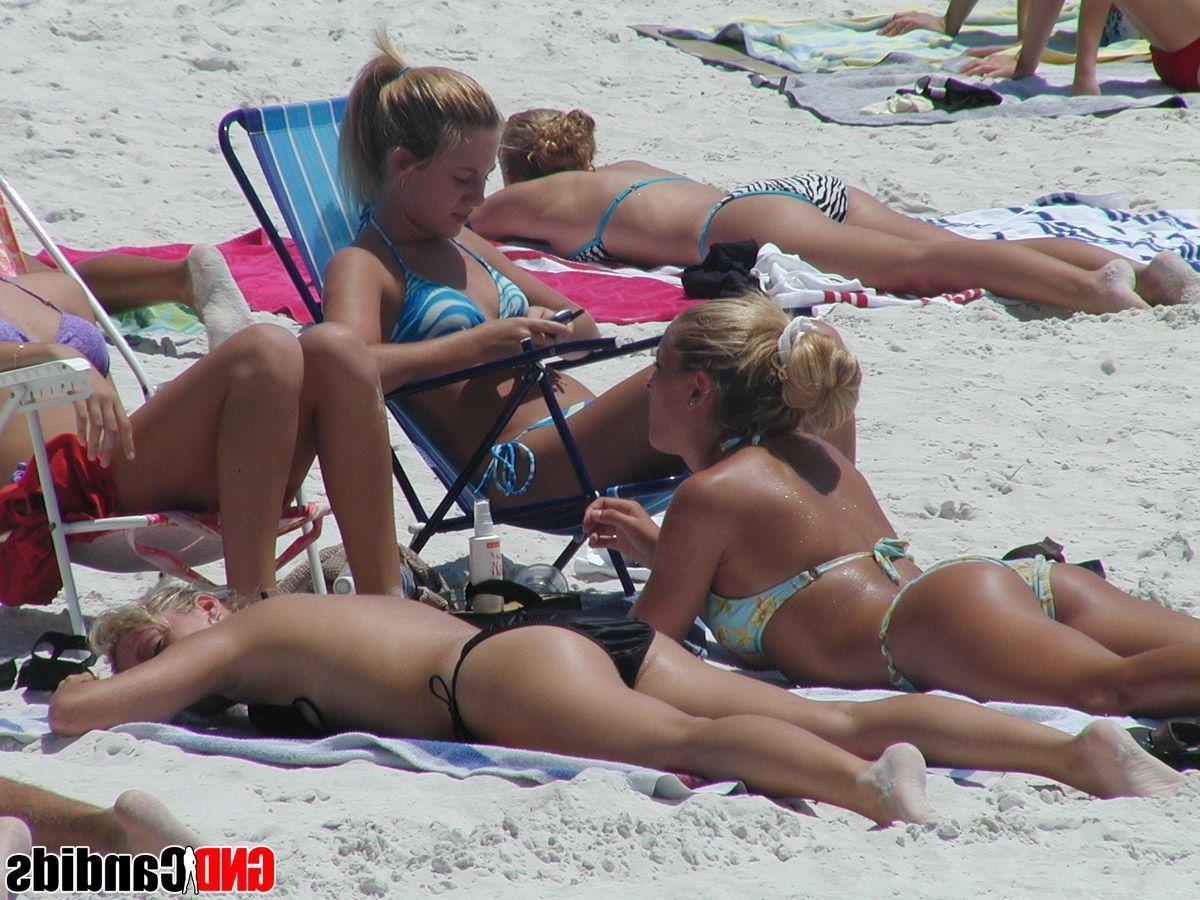 12P Pictures of hot and horny bikini girls on the beach